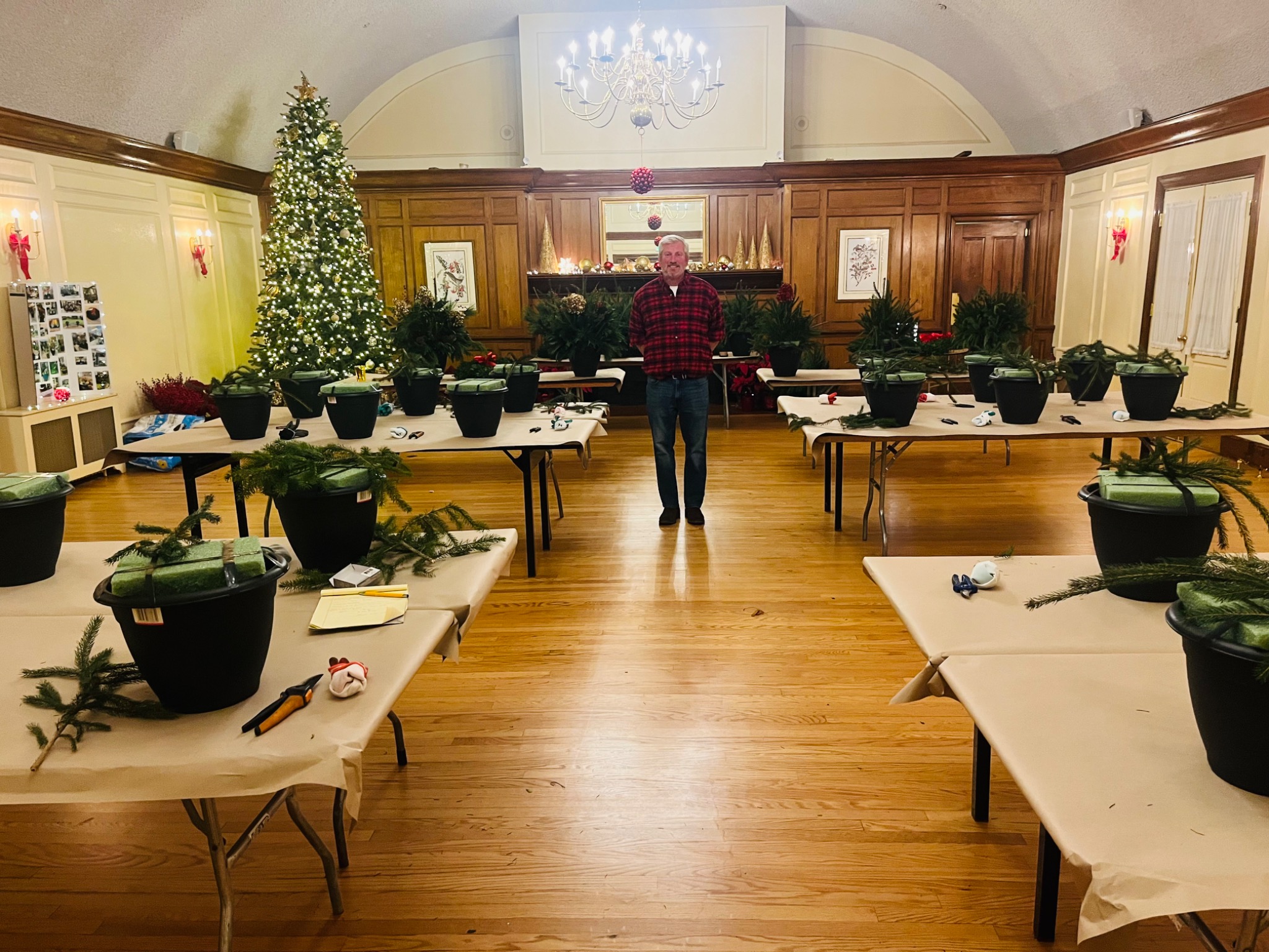 Derek preparing tables for a seasonal container workshop