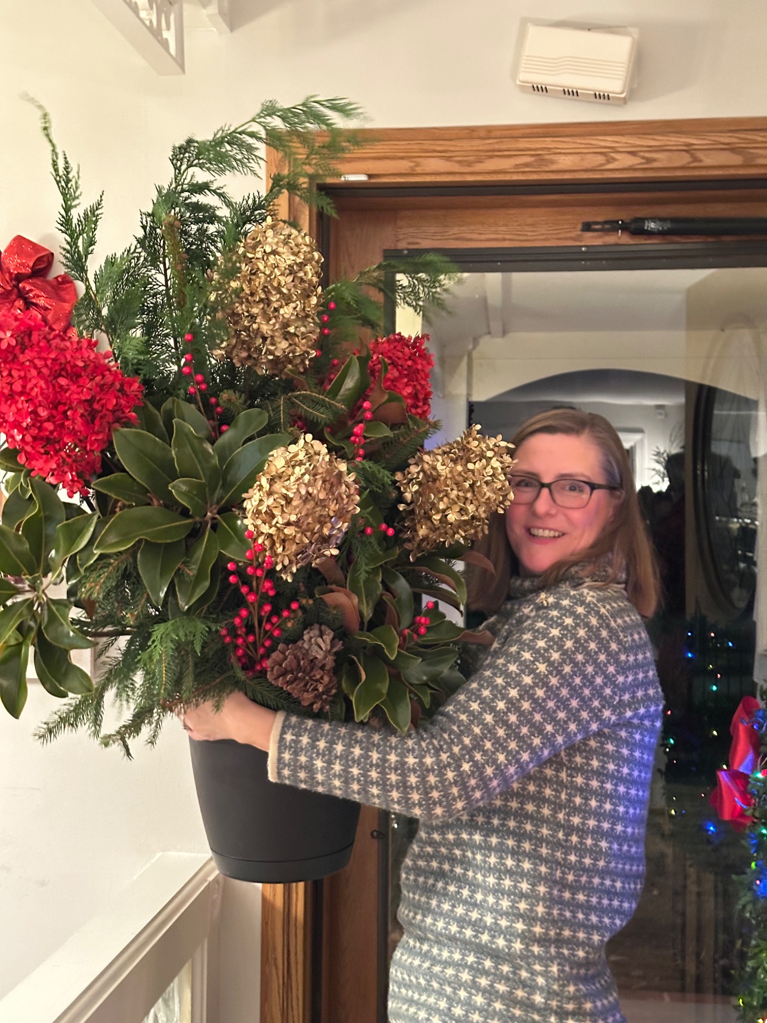 A finished red and gold arrangement at home