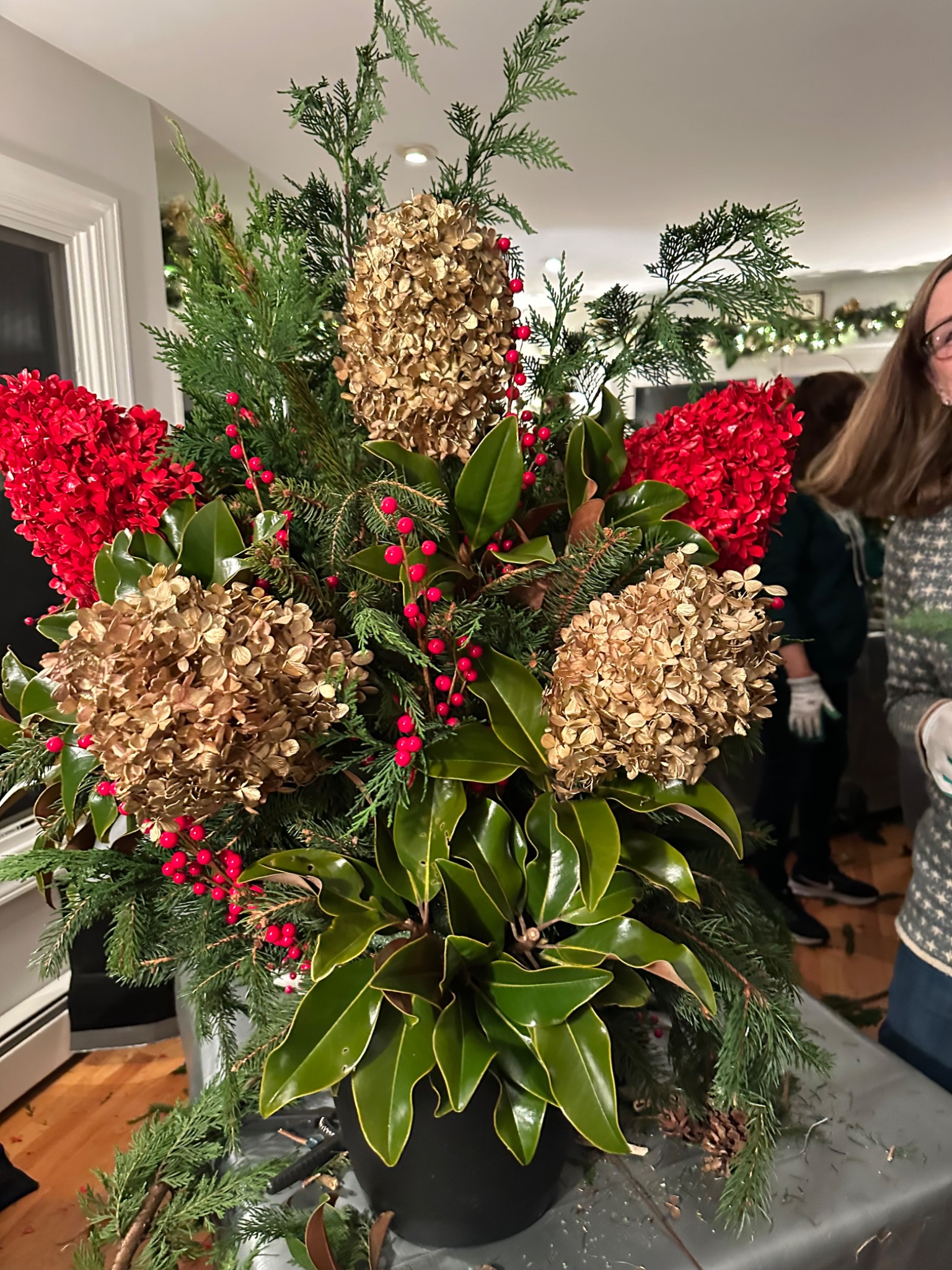A closer look at the red, gold, and magnolia details