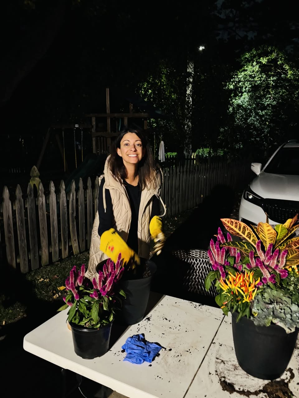 Workshop guest with two finished seasonal planters